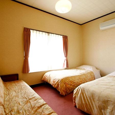 Izumi Hotel อิซุ ภายนอก รูปภาพ