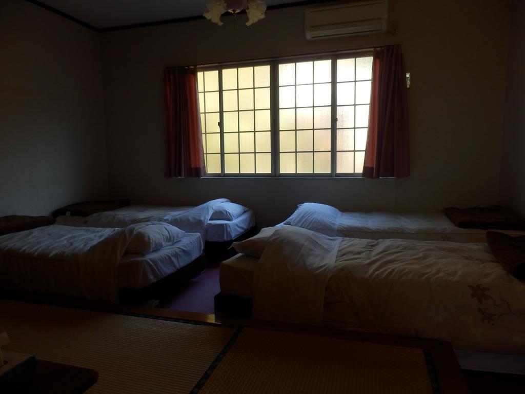 Izumi Hotel อิซุ ภายนอก รูปภาพ
