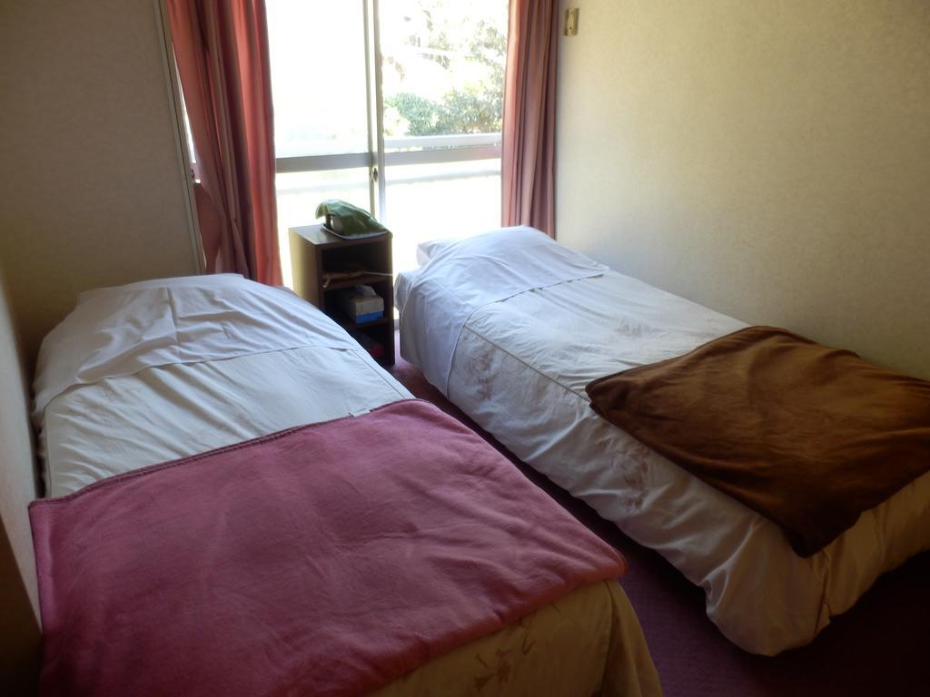 Izumi Hotel อิซุ ภายนอก รูปภาพ