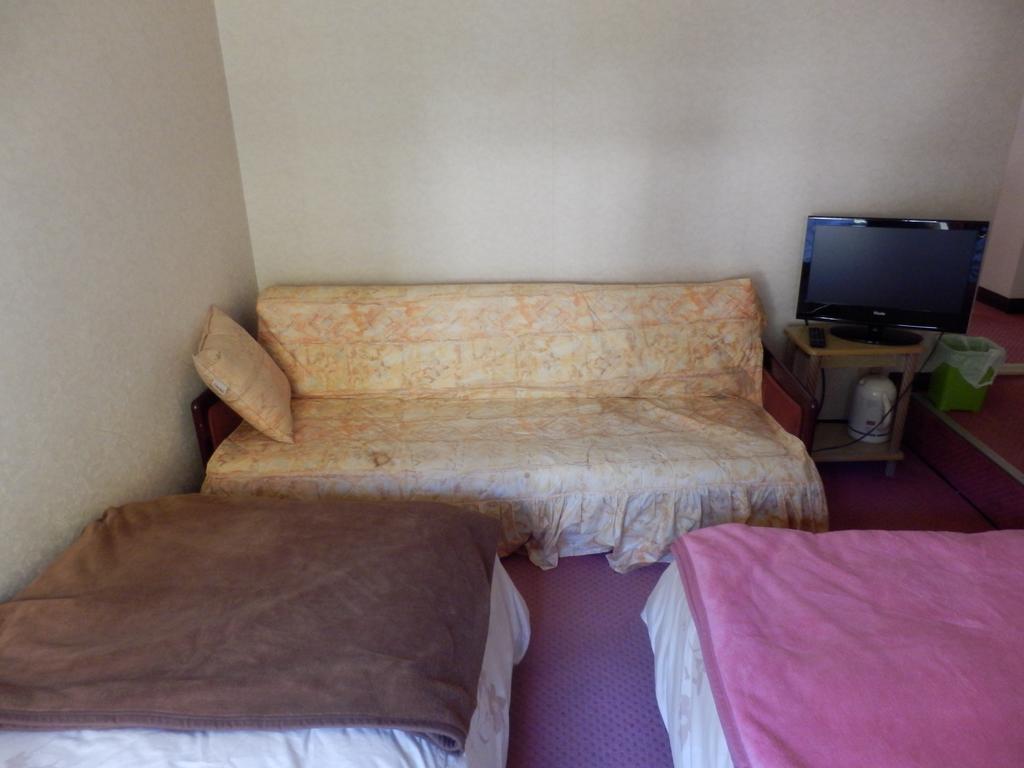 Izumi Hotel อิซุ ภายนอก รูปภาพ