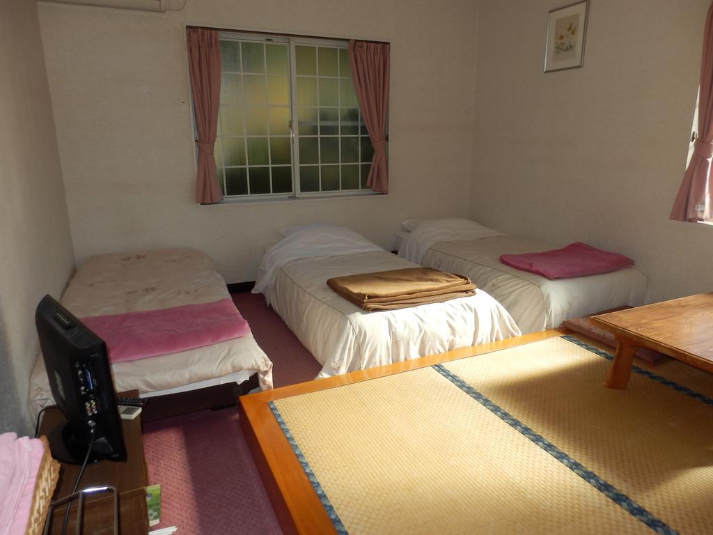 Izumi Hotel อิซุ ภายนอก รูปภาพ