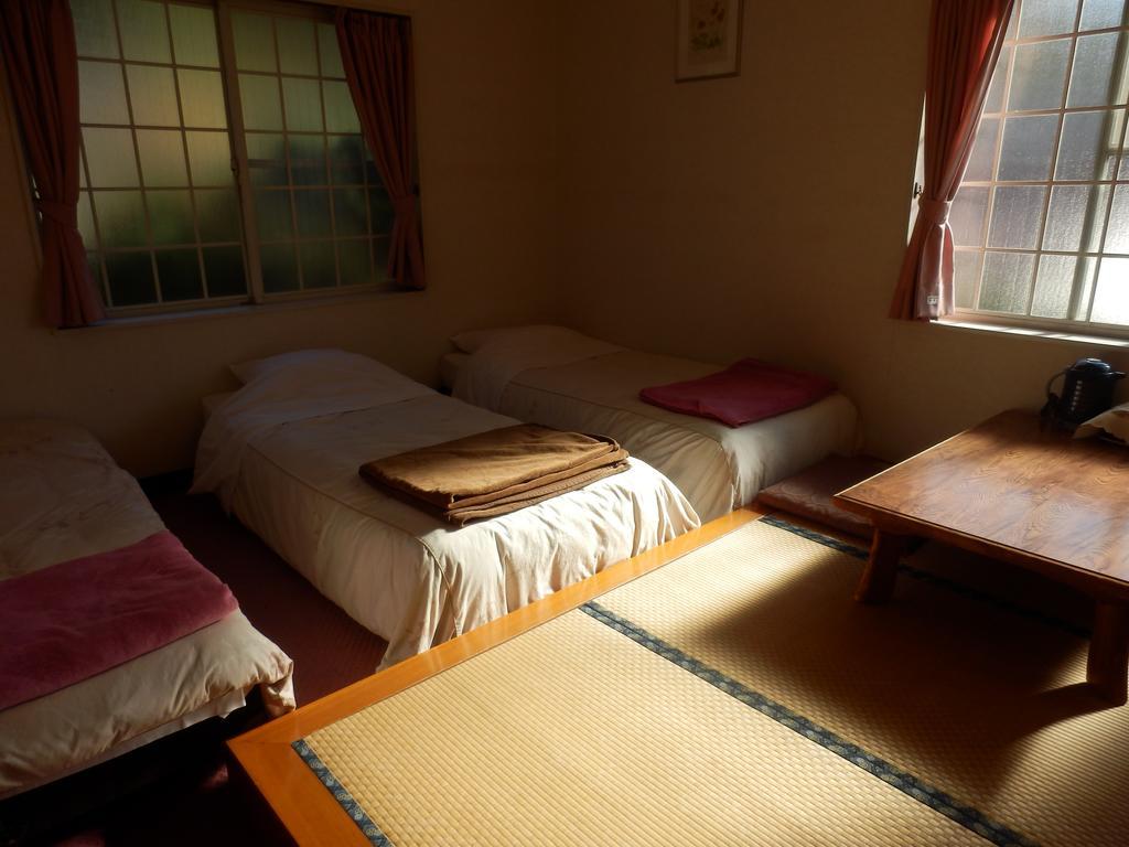 Izumi Hotel อิซุ ภายนอก รูปภาพ