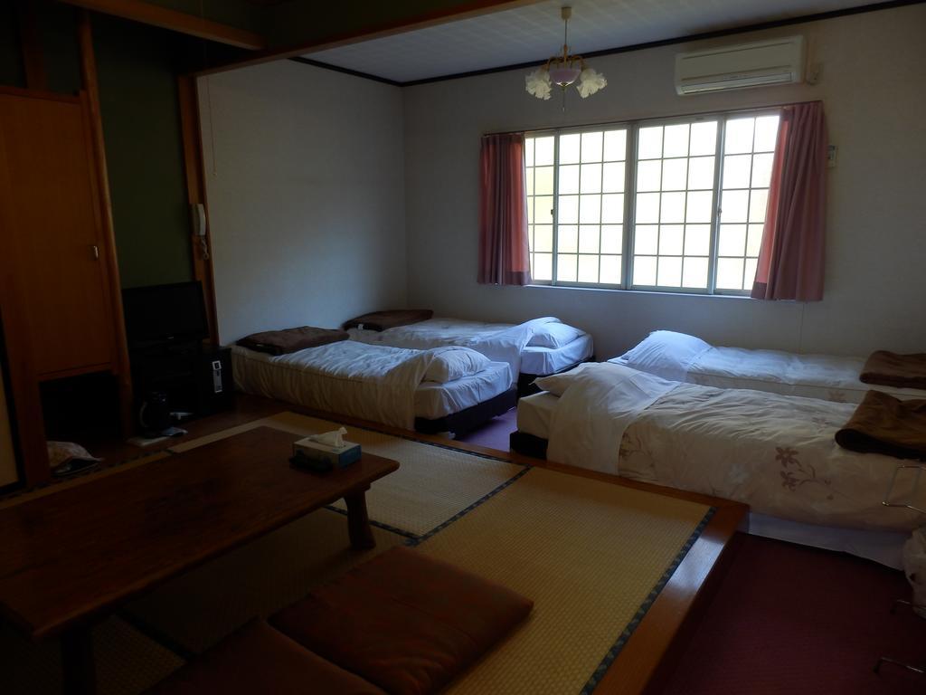 Izumi Hotel อิซุ ภายนอก รูปภาพ