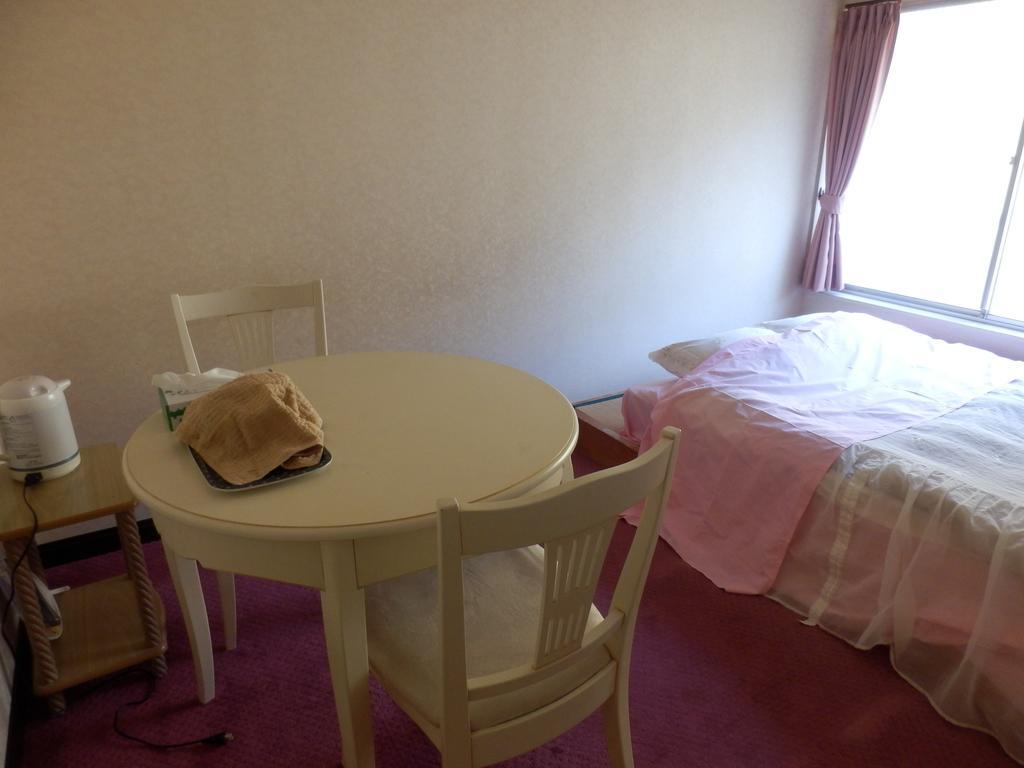 Izumi Hotel อิซุ ภายนอก รูปภาพ