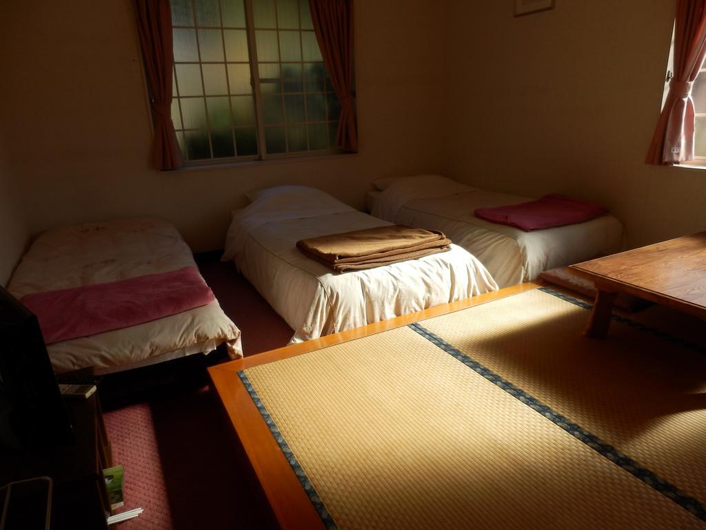 Izumi Hotel อิซุ ภายนอก รูปภาพ